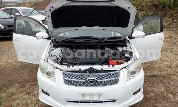 Buy Import Toyota Corolla White Car in Kampala in Uganda Buy Import Toyota Corolla White Car in Kampala in Uganda