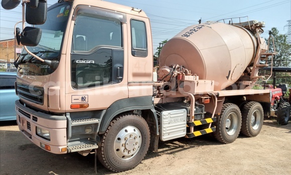 Buy Import Isuzu FTR 850 Beige Truck in Kampala in Uganda