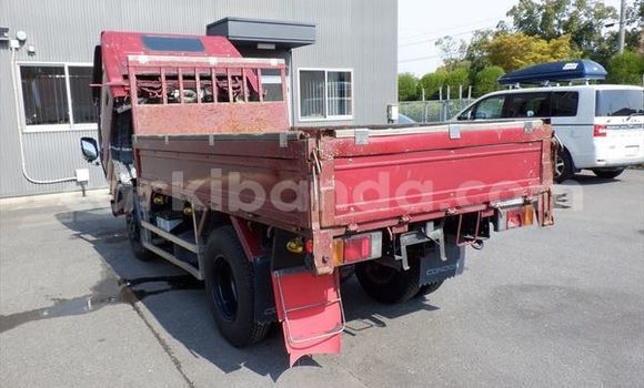 Buy Import Nissan UD Red Truck in Kampala in Uganda Buy Import Nissan UD Red Truck in Kampala in Uganda