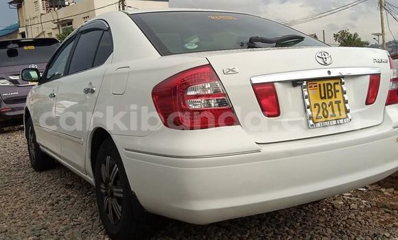 Gura Yakoze Toyota Premio White Imodoka i Kampala mu Uganda Gura Yakoze Toyota Premio White Imodoka i Kampala mu Uganda