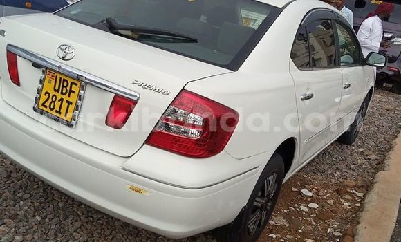 Gura Yakoze Toyota Premio White Imodoka i Kampala mu Uganda Gura Yakoze Toyota Premio White Imodoka i Kampala mu Uganda