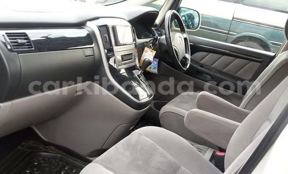 Gura Yakoze Toyota Alphard White Imodoka i Kampala mu Uganda Gura Yakoze Toyota Alphard White Imodoka i Kampala mu Uganda