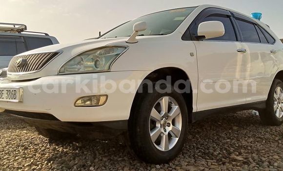 Gura Yakoze Toyota Harrier White Imodoka i Kampala mu Uganda Gura Yakoze Toyota Harrier White Imodoka i Kampala mu Uganda