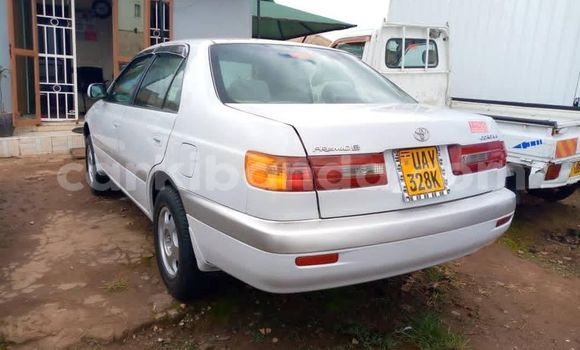 Gura Yakoze Toyota Premio White Imodoka i Kampala mu Uganda Gura Yakoze Toyota Premio White Imodoka i Kampala mu Uganda