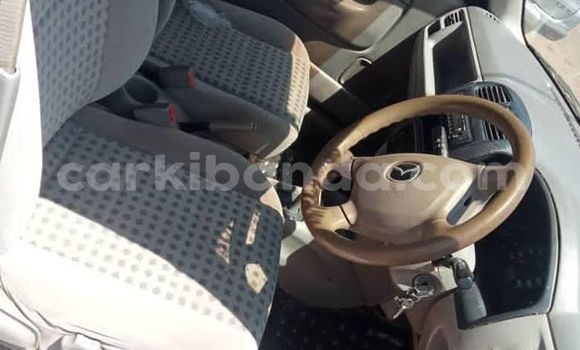 Gura Yakoze Mazda Demio Silver Imodoka i Kampala mu Uganda Gura Yakoze Mazda Demio Silver Imodoka i Kampala mu Uganda