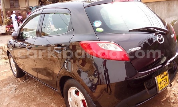 Acheter Occasion Voiture Mazda Demio Noir à Kampala, Ouganda Acheter Occasion Voiture Mazda Demio Noir à Kampala, Ouganda