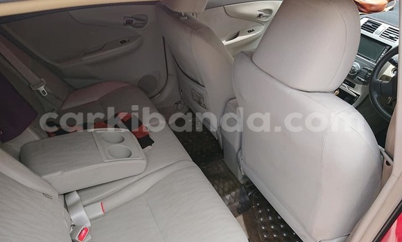 Gura Yakoze Toyota Fielder Red Imodoka i Kampala mu Uganda Gura Yakoze Toyota Fielder Red Imodoka i Kampala mu Uganda