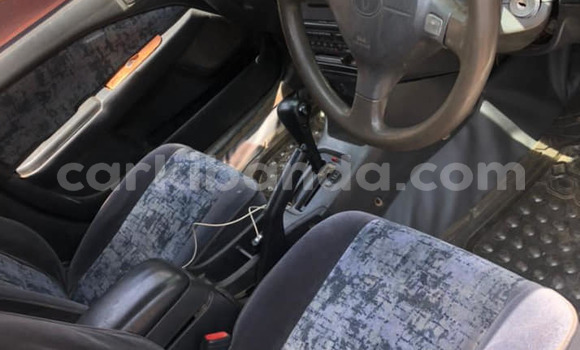 Gura Yakoze Toyota Premio White Imodoka i Kampala mu Uganda Gura Yakoze Toyota Premio White Imodoka i Kampala mu Uganda