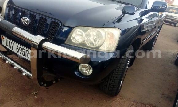 Gura Yakoze Toyota Kluger Blue Imodoka i Kampala mu Uganda