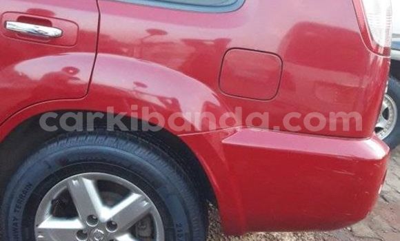 Acheter Occasion Voiture Nissan X–Trail Rouge à Kampala, Ouganda Acheter Occasion Voiture Nissan X–Trail Rouge à Kampala, Ouganda