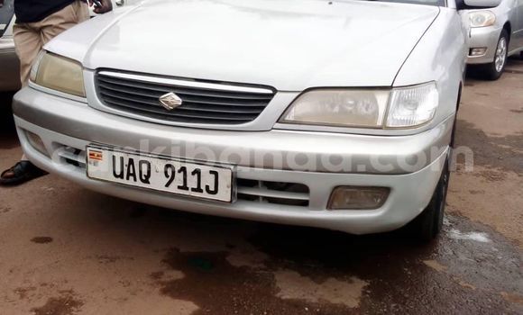 Gura Yakoze Toyota Premio White Imodoka i Kampala mu Uganda