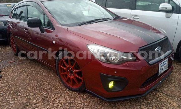 Gura Yakoze Subaru Impreza Red Imodoka i Kampala mu Uganda