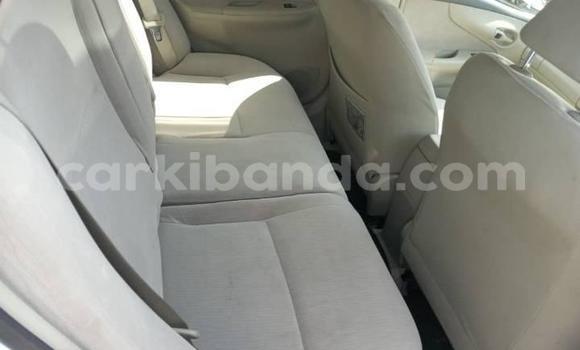 Gura Yakoze Toyota Fielder White Imodoka i Kampala mu Uganda Gura Yakoze Toyota Fielder White Imodoka i Kampala mu Uganda