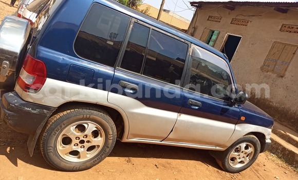 Gura Yakoze Mitsubishi Pajero Mini Blue Imodoka i Kampala mu Uganda Gura Yakoze Mitsubishi Pajero Mini Blue Imodoka i Kampala mu Uganda