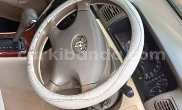 Gura Yakoze Toyota Corolla Brown Imodoka i Kampala mu Uganda Gura Yakoze Toyota Corolla Brown Imodoka i Kampala mu Uganda