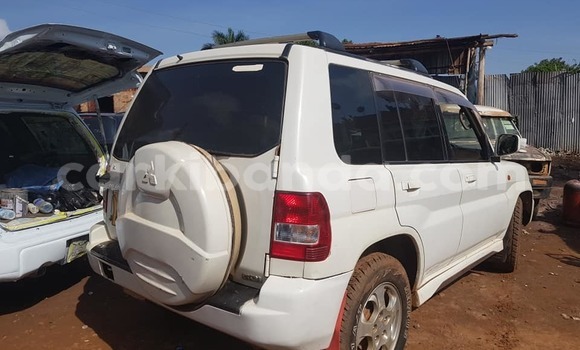 Acheter Occasion Voiture Mitsubishi Pajero Junior Blanc à Kampala, Ouganda Acheter Occasion Voiture Mitsubishi Pajero Junior Blanc à Kampala, Ouganda