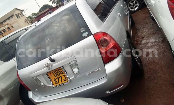 Gura Yakoze Toyota Fielder Silver Imodoka i Kampala mu Uganda Gura Yakoze Toyota Fielder Silver Imodoka i Kampala mu Uganda