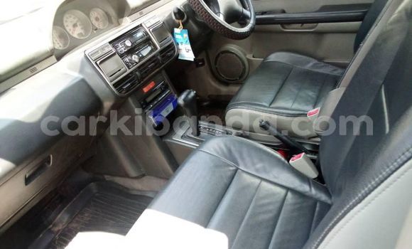 Gura Yakoze Nissan X–Trail Silver Imodoka i Kampala mu Uganda Gura Yakoze Nissan X–Trail Silver Imodoka i Kampala mu Uganda