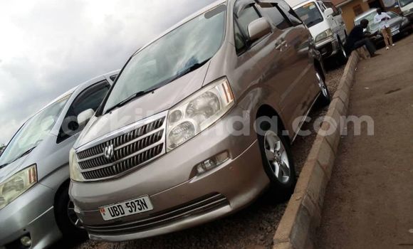 Gura Yakoze Toyota Alphard Brown Imodoka i Kampala mu Uganda