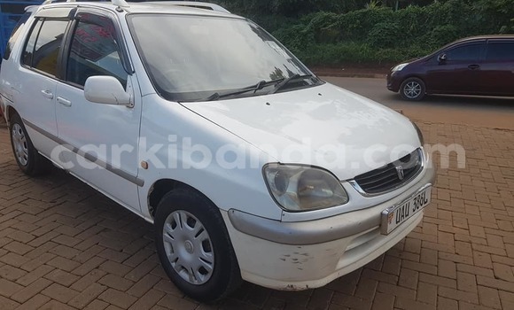 Buy Used Toyota Raum White Car in Kampala in Uganda Buy Used Toyota Raum White Car in Kampala in Uganda
