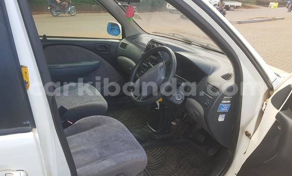 Buy Used Toyota Raum White Car in Kampala in Uganda Buy Used Toyota Raum White Car in Kampala in Uganda