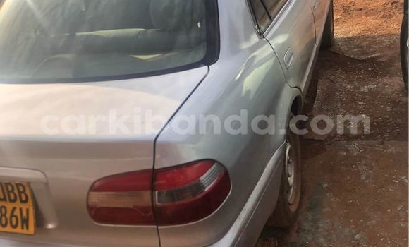 Gura Yakoze Toyota Corolla Silver Imodoka i Kampala mu Uganda Gura Yakoze Toyota Corolla Silver Imodoka i Kampala mu Uganda