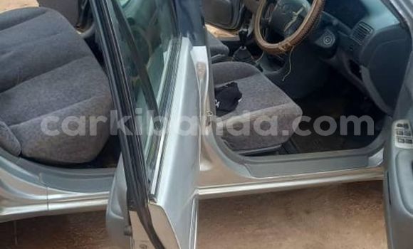 Gura Yakoze Toyota Corolla Silver Imodoka i Kampala mu Uganda Gura Yakoze Toyota Corolla Silver Imodoka i Kampala mu Uganda