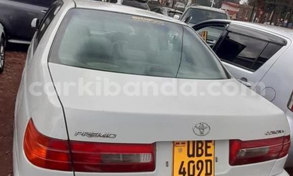 Gura Yakoze Toyota Premio White Imodoka i Kampala mu Uganda Gura Yakoze Toyota Premio White Imodoka i Kampala mu Uganda