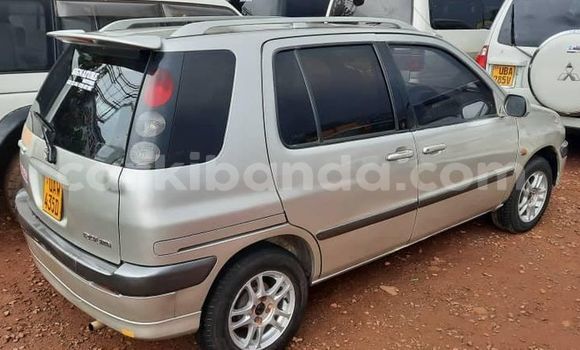 Buy Used Toyota Raum Silver Car in Kampala in Uganda