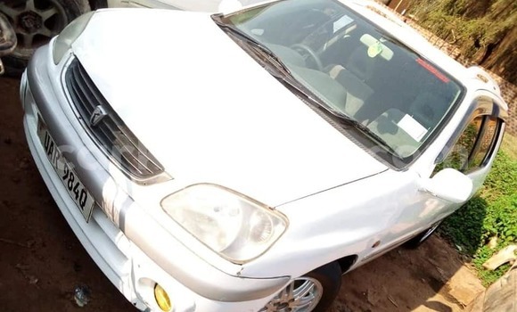 Buy Used Toyota Raum White Car in Kampala in Uganda
