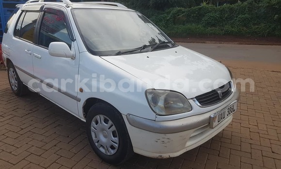 Buy Used Toyota Raum White Car in Kampala in Uganda