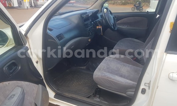 Buy Used Toyota Raum White Car in Kampala in Uganda Buy Used Toyota Raum White Car in Kampala in Uganda