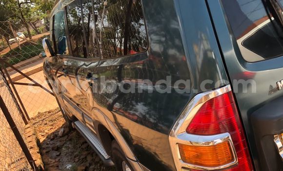 Gura Yakoze Mitsubishi Pajero Green Imodoka i Kampala mu Uganda Gura Yakoze Mitsubishi Pajero Green Imodoka i Kampala mu Uganda