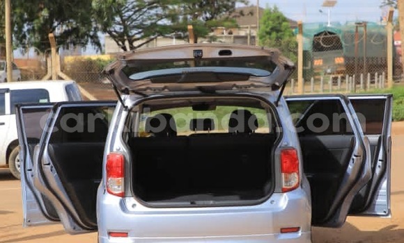 Gura Yakoze Toyota Corolla Rumion Blue Imodoka i Kampala mu Uganda Gura Yakoze Toyota Corolla Rumion Blue Imodoka i Kampala mu Uganda