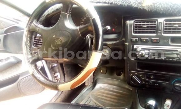 Gura Yakoze Toyota Carina E White Imodoka i Kampala mu Uganda Gura Yakoze Toyota Carina E White Imodoka i Kampala mu Uganda