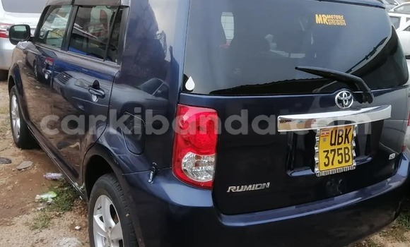 Gura Yakoze Toyota Corolla Rumion Blue Imodoka i Kampala mu Uganda Gura Yakoze Toyota Corolla Rumion Blue Imodoka i Kampala mu Uganda