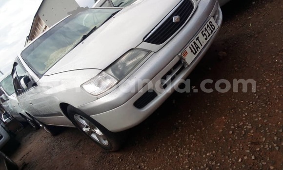 Gura Yakoze Toyota Premio Silver Imodoka i Kampala mu Uganda