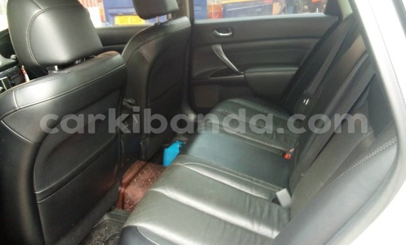 Gura Yakoze Nissan Teana White Imodoka i Kampala mu Uganda Gura Yakoze Nissan Teana White Imodoka i Kampala mu Uganda