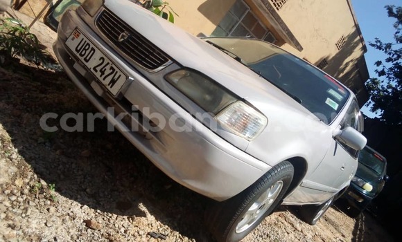 Gura Yakoze Toyota Corolla White Imodoka i Kampala mu Uganda Gura Yakoze Toyota Corolla White Imodoka i Kampala mu Uganda