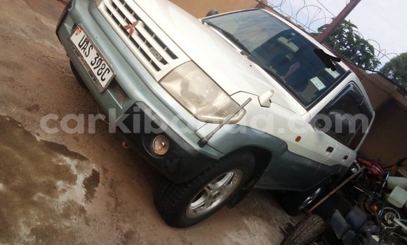 Gura Yakoze Mitsubishi Pajero iO White Imodoka i Kampala mu Uganda