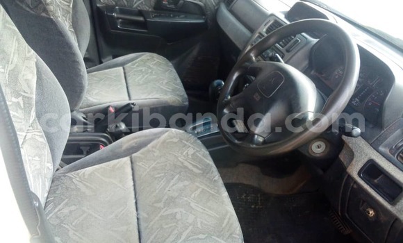Gura Yakoze Mitsubishi Pajero iO White Imodoka i Kampala mu Uganda Gura Yakoze Mitsubishi Pajero iO White Imodoka i Kampala mu Uganda