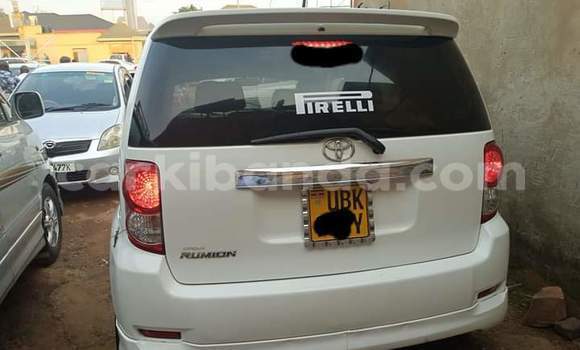 Gura Yakoze Toyota Corolla Rumion White Imodoka i Kampala mu Uganda Gura Yakoze Toyota Corolla Rumion White Imodoka i Kampala mu Uganda