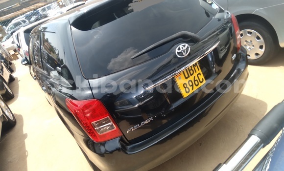 Gura Yakoze Toyota Fielder Black Imodoka i Kampala mu Uganda Gura Yakoze Toyota Fielder Black Imodoka i Kampala mu Uganda