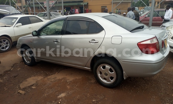 Gura Yakoze Toyota Premio Silver Imodoka i Kampala mu Uganda Gura Yakoze Toyota Premio Silver Imodoka i Kampala mu Uganda