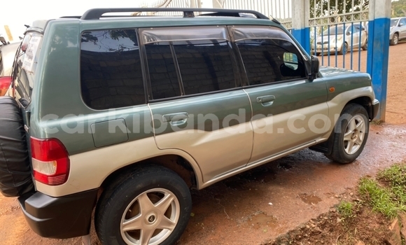 Acheter Occasion Voiture Mitsubishi Pajero iO Vert à Kampala, Ouganda Acheter Occasion Voiture Mitsubishi Pajero iO Vert à Kampala, Ouganda
