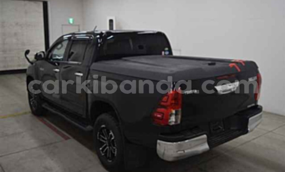 Gura Imported Toyota Hilux Black Imodoka i Jinja–Kawempe mu Central Gura Imported Toyota Hilux Black Imodoka i Jinja–Kawempe mu Central