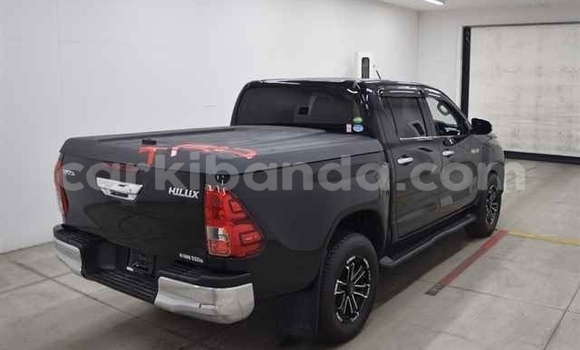 Gura Imported Toyota Hilux Black Imodoka i Jinja–Kawempe mu Central Gura Imported Toyota Hilux Black Imodoka i Jinja–Kawempe mu Central