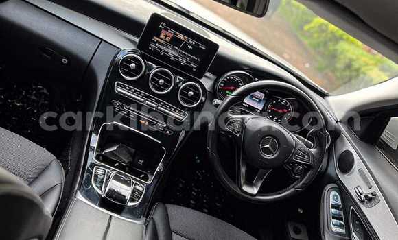 Nunua Ilio tumika Mercedes-Benz C180 coupe Nyeupe Gari ndani ya Kampala nchini Uganda Nunua Ilio tumika Mercedes-Benz C180 coupe Nyeupe Gari ndani ya Kampala nchini Uganda
