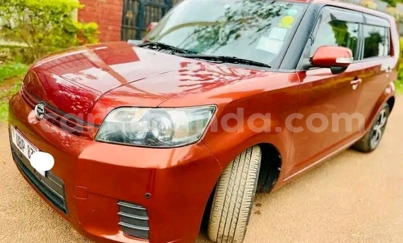 Gura Yakoze Toyota Raum Red Imodoka i Kampala mu Uganda