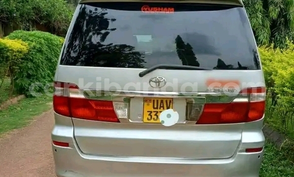 Gura Yakoze Toyota Alphard Beige Imodoka i Kampala mu Uganda